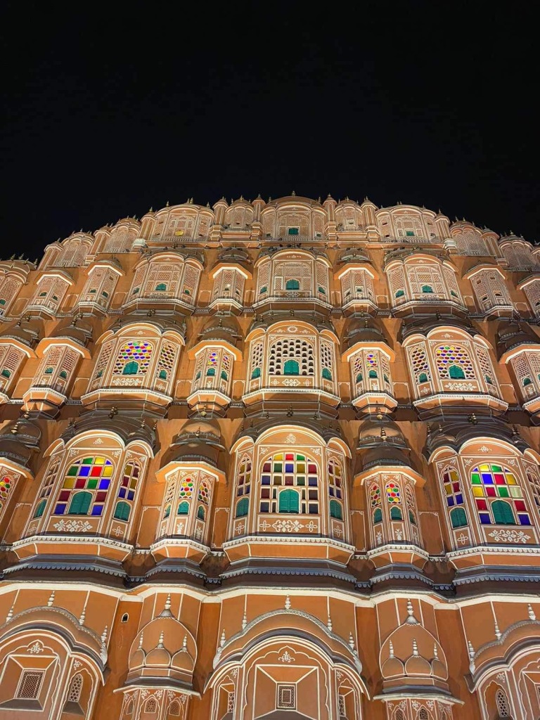Jaipur's Hawa Mahal, lit up at night. 